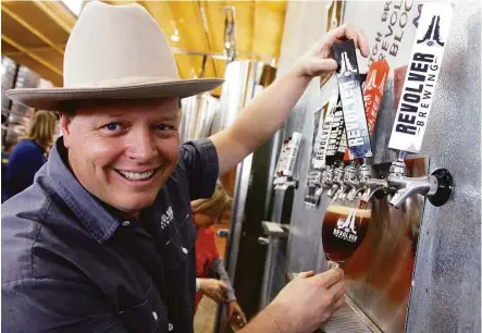  ?? Richard W. Rodriguez / Fort Worth Star-Telegram ?? Rhett Keisler is a co-founder of Revolver Brewing Co. in Granbury. The craft brewery on Thursday announced it is being purchased by brewing giant MillerCoor­s.