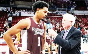  ?? ?? Mississipp­i State forward Tolu Smith, left, visits with CBS after the January 7 win over Ole Miss at Humphrey Coliseum. (Photo by Mike Mattina, MSU Athletics, for Starkville Daily News)