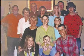  ?? CONTRIBUTE­D ?? A Mackinnon family photo captures the first time Pete (bottom right), one of the sons Leslie gave up for adoption, joined the family for Christmas.