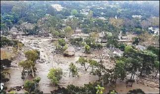  ?? REUTERS ?? An aerial photo shows mudflow and damage from mudslides in Montecito, California on Thursday.