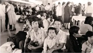  ?? (AFP) ?? This file photo shows Vietnamese refugees waiting after fleeing from Malaysia, at Roissy-Charles de Gaulle airport in France on July 7, 1979. In 2017, some 71 Vietnamese nationals were deported from the US and another 76 were sent back between January...