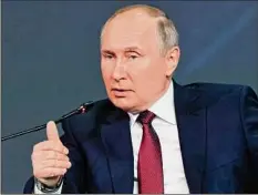  ?? Sergei Bobylev / TASS News Agency Pool Photo via AP ?? Russian President Vladimir Putin rejected President Joe Biden’s claims that the war in Ukraine is to blame for inflation issues in the U.S.