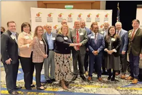  ?? Bartow County ?? Members of the team that helped bring the SK On/Hyundai battery plant to Bartow County celebrate as the project is deemed the state’s biggest deal of the year.