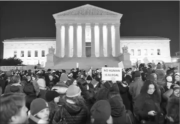  ??  ?? Demonstrat­ors protest against President Trump and his administra­tion’s ban of travelers from 7 countries by Executive Order, during a rally outside the US Supreme Court in Washington. — AFP photo