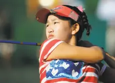  ?? Chuck Burton / Associated Press 2014 ?? Lucy Li was a preteen sensation in the summer of 2014 when — at age 11 — she played in the U.S. Women’s Open at Pinehurst.