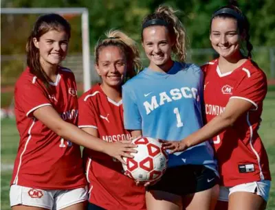  ?? BARRY CHIN/GLOBE STAFF ?? It’s all hands on deck for the unbeaten Masconomet girls’ soccer team (8-0), led by senior captains (from left) Kendall Skulley, Kylie DuMont, Marcy Clapp, and Taylor Bovardi.
