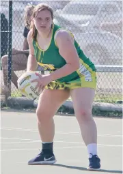  ??  ?? Meaghan Hawkett considers her options down the court during Hill End’s D grade game on Saturday. Yinnar won 53-17.