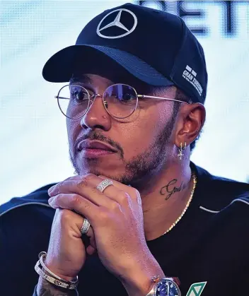  ??  ?? Lewis Hamilton in Sao Paulo: ‘I don’t think more races is going to be a good thing’NELSON ALMEIDA/AFP
