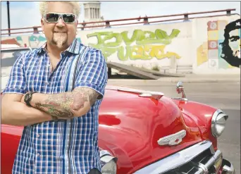  ?? ?? Guy Fieri hosts “Diners, Drive-Ins and Dives”