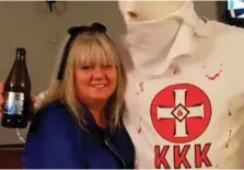  ??  ?? Condemned: (Top) The group in KKK garb outside the mosque in Newtownard­s; (above) Sharon Mellor poses with one of them