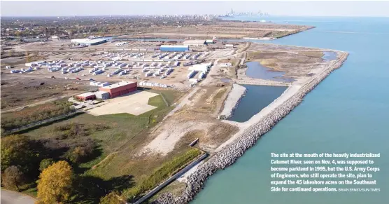  ?? BRIAN ERNST/SUN-TIMES ?? The site at the mouth of the heavily industrial­ized Calumet River, seen on Nov. 4, was supposed to become parkland in 1995, but the U.S. Army Corps of Engineers, who still operate the site, plan to expand the 45 lakeshore acres on the Southeast Side for continued operations.