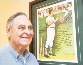  ?? FILE PHOTO BY JOSHUA MCKERROW/CAPITAL GAZETTE ?? Tom Riggin didn't hang this signed poster from Brooks Robinson until his family members insisted on it. The former Anne Arundel County Liquor Board chairman was friends with the Orioles' Hall of Famer. Riggin died Jan. 6 at the age of 87.