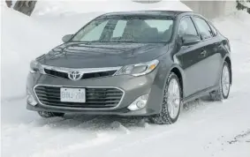  ??  ?? The 2013 Toyota Avalon XLE is smooth on the road and plush in the interior.