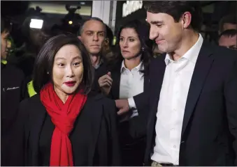 ?? CP PHOTO CHRISTOPHE­R KATSAROV ?? Liberal Jean Yip has declared victory in the federal byelection for the Toronto riding of Scarboroug­hAgincourt, a riding left vacant by the death of her husband, Arnold Chan. Justin Trudeau joins Liberal candidate Jean Yip in Toronto on Wednesday.