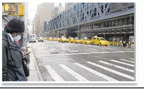  ??  ?? Traffic was light in Midtown on Tuesday as Mayor de Blasio and Gov. Cuomo (opposite page) faced off over whether New Yorkers might soon face a draconian “shelter-in-place” order, which Hizzoner warned of and the governor discounted.