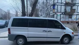  ?? ABo local media developmen­t agency pHotos ?? DELIVERED: Nastya Pavlova and some relatives pooled money to buy a minibus that she took to the besieged city of Mariupol, Ukraine, to rescue her parents and their neighbors. At right, the family is seen before the war.