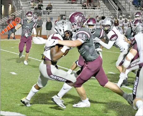  ?? Blake Fogleman/Special to Siloam Sunday ?? Siloam Springs kick returner Primo Agbehi is wrapped up by Benton’s Tristan Hawkins during a kickoff Friday at the Benton Athletics Complex. Benton defeated Siloam Springs 55-14.