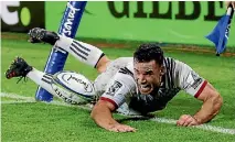  ?? GETTY IMAGES ?? Ryan Crotty scores a crucial try for the Crusaders in Buenos Aires.