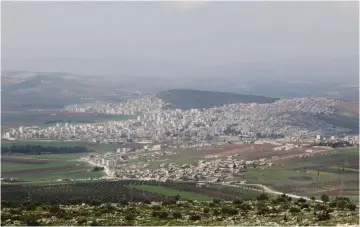  ??  ?? A VIEW of the city of Afrin, in Aleppo’s countrysid­e.