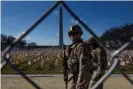  ?? Photograph: Stephanie Keith/Getty Images ?? National Guard members patrol the National Mall in Washington DC.