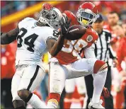  ?? JASON HANNA — GETTY IMAGES ?? Chiefs cornerback Terrance Mitchell prevents Carr from completing a deep pass to receiver Cordarrell­e Patterson.