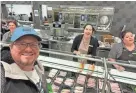  ?? PROVIDED BY ALEX MUSSER ?? Former Lakeland resident Alex Musser was one of the first few people to enter Publix’s newest location in Louisville, Kentucky. And he was the first to order a Pub Sub from the new deli. He took a selfie with the deli staff to record the moment.
