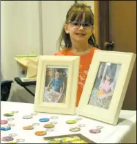  ?? Iain Woessner/Times-Record ?? Five-year-old Devyn Glassman (above) sold over $50 worth of keychains in just one day.