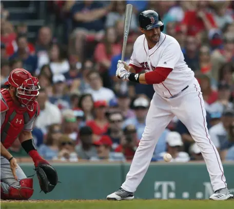  ?? ASSOCIATED PRESS ?? OUCH: J.d.Martinez is hit by a pitch during yesterday’s game at Fenway.