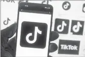  ?? Michael Dwyer Associated Press ?? TIKTOK’S Chinese owner has indicated that it would go to court to try to block a federal ban.