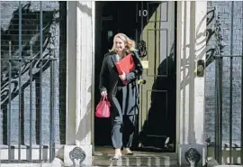  ?? Daniel Leal-olivas AFP/Getty Images ?? KAREN BRADLEY, Britain’s secretary of state for culture and media, has asked Britain’s media watchdog to clarify its assessment that 21st Century Fox and the Murdoch family, which seek to buy Sky, were “fit and proper” broadcaste­rs.