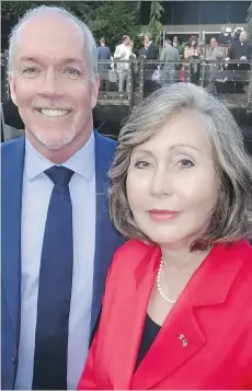  ??  ?? Then-premier elect John Horgan attends soon-to-depart U.S. consul general Lynne Platt’s delayed Fourth of July reception at Vancouver Aquarium.