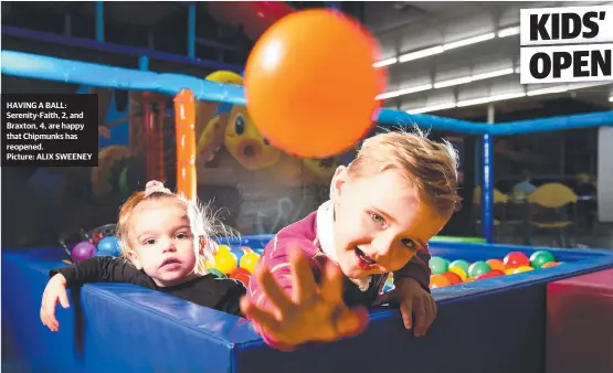  ??  ?? HAVING A BALL: Serenity-faith, 2, and Braxton, 4, are happy that Chipmunks has reopened.
Picture: ALIX SWEENEY