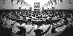  ??  ?? Members of Parliament listening to the speech delivered by Yang di-Pertuan Agong Sultan Muhammad V. - Bernama photo