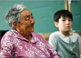  ?? WEI XIAOHAO / CHINA DAILY ?? Pan Yulian, 79, has helped educate over 2,000 children.