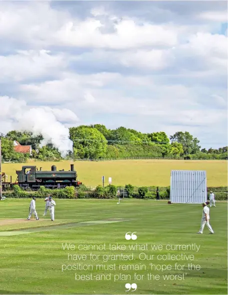  ?? KENNY FELSTEAD ?? A bucolic Chinnor & Princes Risborough scene alongside the cricket ground at Bledlow while pannier tank
No. 6412 saunters past almost unnoticed with a demonstrat­ion ballast train on July 19.