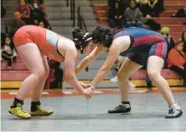  ?? ?? Parkland’s Shannon Fratus, left, won her 170-pound match by pin Wednesday in an EPC dual meet against Liberty.