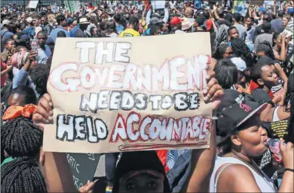  ?? Photo: Nardus Engelbrech­t/ Gallo Images ?? Clear message: Students protest outside Parliament last year against a proposed hike in tuition fees. In an open letter to government, more than 1200 academics said universiti­es had reached a limit and could not ‘weather any further cuts without...