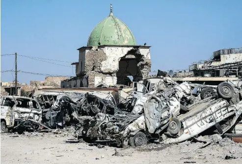  ?? ZAID AL-OBEIDI / AFP / GETTY IMAGES ?? The dome of the destroyed Al-Nuri Mosque in the Old City of Mosul, a year after the city was retaken by the Iraqi government forces. The western part of the city is basically eight million tons of rubble, Frank Giustra writes.