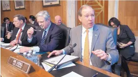  ?? J. SCOTT APPLEWHITE/ASSOCIATED PRESS ?? Right to left, Sen. Tom Udall, D-N.M., Vice Chair of the Senate Committee on Indian Affairs; Sen. John Hoeven, R-N.D., the chairman; and Sen. John Barrasso, R-Wyo.