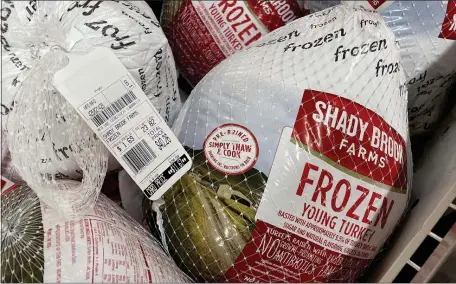 ?? MATT STONE — BOSTON HERALD ?? Turkey prices are up 21% this year. Here are turkeys for sale at Stop and Shop in Boston on Wednesday.