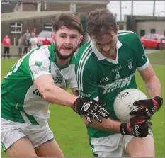  ??  ?? A clash of two big men as Colm Kehoe (Cloughbawn) tries to negotiate a route around Crossabeg-Ballymurn’s Pádraig Foley.