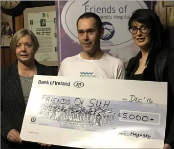  ??  ?? Templeboy man Aidan Hegarty raised € 5,000 from his fundraisin­g cycle of the Wild Atlantic Way for Stroke Services at Sligo University Hospital. Aidan is pictured above presenting a cheque to Mary Tighe, Adm Friends of SUH and AnneMarie Kilgannon,...