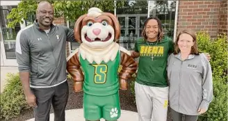  ?? Photo courtesy of Siena College Athletics ?? Siena women's basketball assistant coaches Terry Primm, left, and Jayla Scaife, second from right, with director of basketball operations Morgan Roche, right.