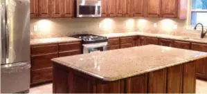  ??  ?? The mission of TCG Custom Granite is to provide quality craftsmans­hip for every job the staff does whether it is a custom kitchen or bath.