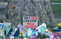  ?? (Dylan Martinez/Reuters) ?? SOME OF THE tributes that were left under a tree near the place where Sarah Everard was kidnapped by a then-serving police officer before he murdered her. Wayne Couzens was sentenced to a full life term last week.