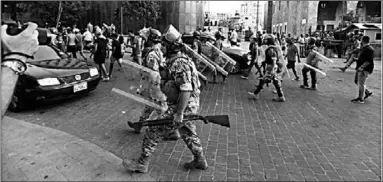  ??  ?? Lebanese army soldiers are deployed during a protest in the aftermath of last week’s deadly blast in Beirut. (Photo: Al Jazeera)