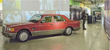  ?? Picture: MARTIN RHODES ?? MEMORY LANE: A Nelson Mandela display at the Apartheid Museum in 2009 includes the former president's iconic red Mercedes-benz.