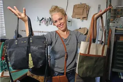  ?? Charles Trainor Jr. / Miami Herald/TNS ?? Tiffany Zadi with some of her purses in her studio at home in Miami.