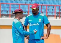  ?? AFP ?? Richard Pybus (left) and Shannon Gabriel during a training session in Saint Lucia. —