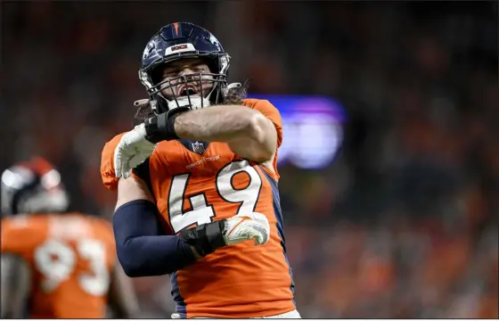  ?? AARON ONTIVEROZ — THE DENVER POST ?? Broncos linebacker Alex Singleton reacts to making a stop against the Colts last season at Empower Field at Mile High in Denver.